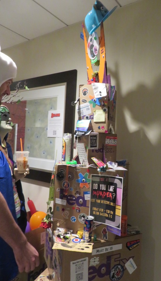 Shrine of Jon the Fed Ex Guy! Lots of googly-eyes and Federal Express packaging.