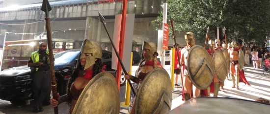 More Spartans marching, including women.