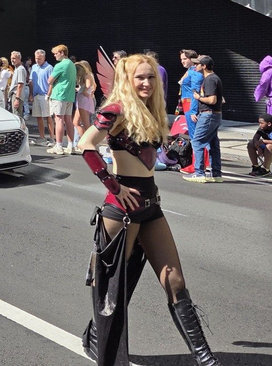 warrior woman in red and black armor