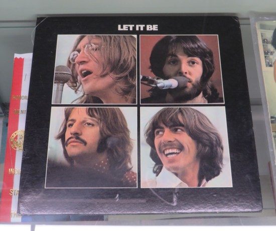 Beatles album "Let It Be" with separate photos of all four members with all their hair at its longest.