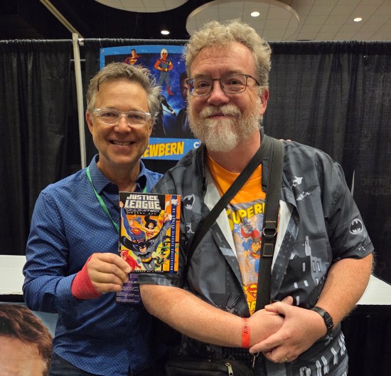 me posing with George Newbern and my "Justice League Unlimited" season 1 set.