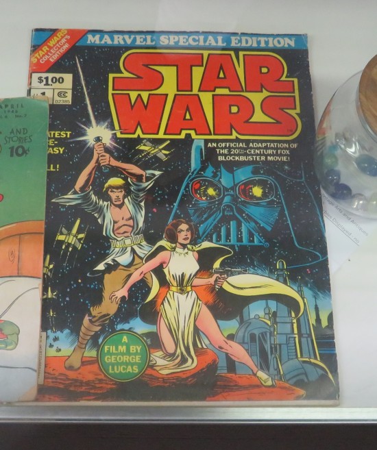 Oversized comic book with the Star Wars on it.