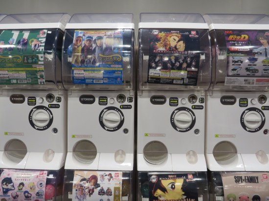 Rows of white Japanese vending machines.