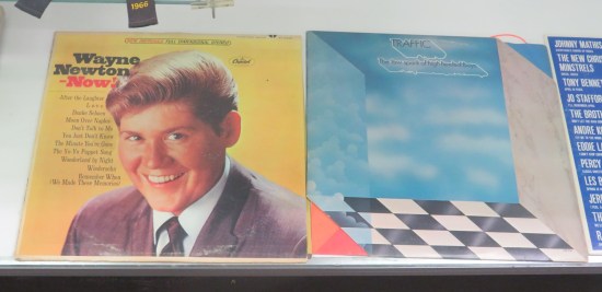 Two old records, "Wayne Newton Now!" and Traffic's The Low Spark of High Heeled Boys".