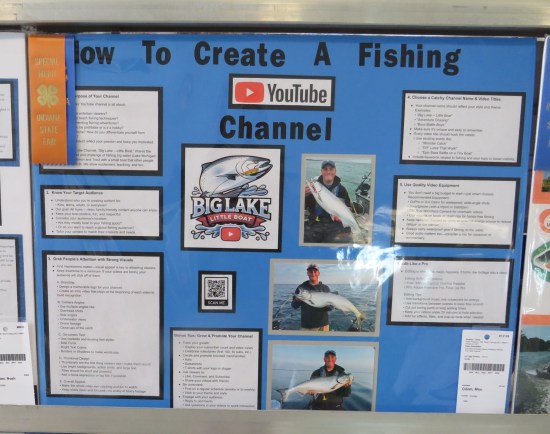Blue poster titled "How to Create a Fishing YouTube  Channel" with lots of small print and three photos of a guy holding a real big fish.