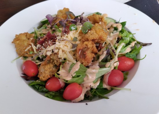 Fried Oyster salad, refer to caption.