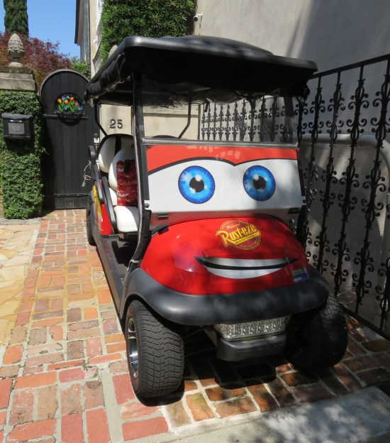 Golf cart painted to look like Lightning McQueen from Pixar's "Cars".