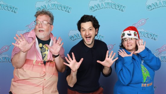 Us doing jazz hands with Ben Schwartz, who's very into it.
