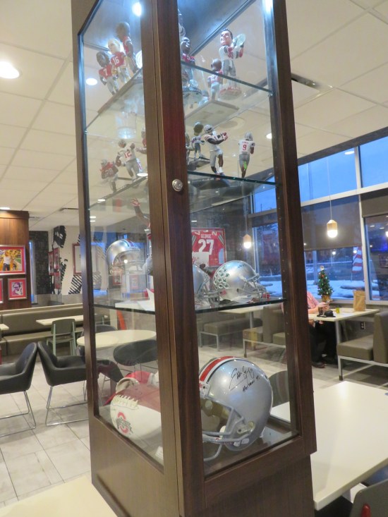 One last giant disoplay with bobbleheads, football player statuettes, and still more helmets.
