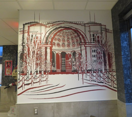 Large drawing of a rotunda entrance in red and black on white, with Bob Ross wintertime trees out front.
