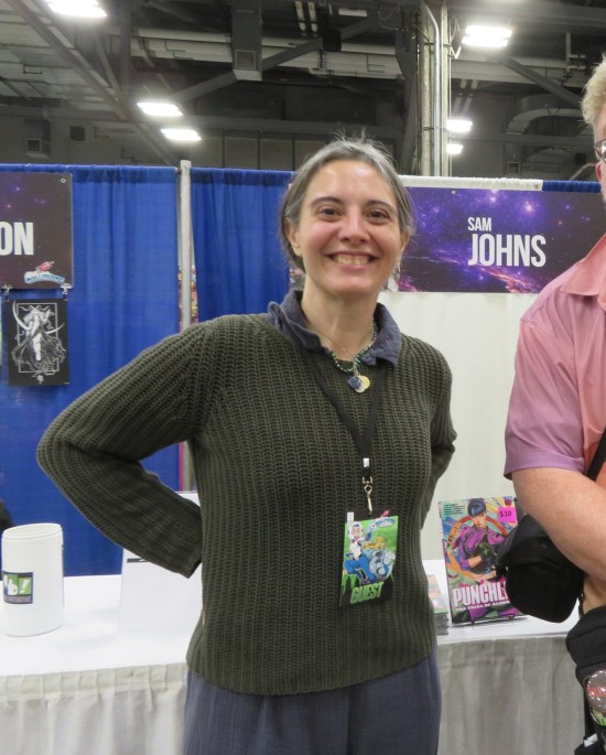 Sam Johns at her booth. My elbow is next to her.