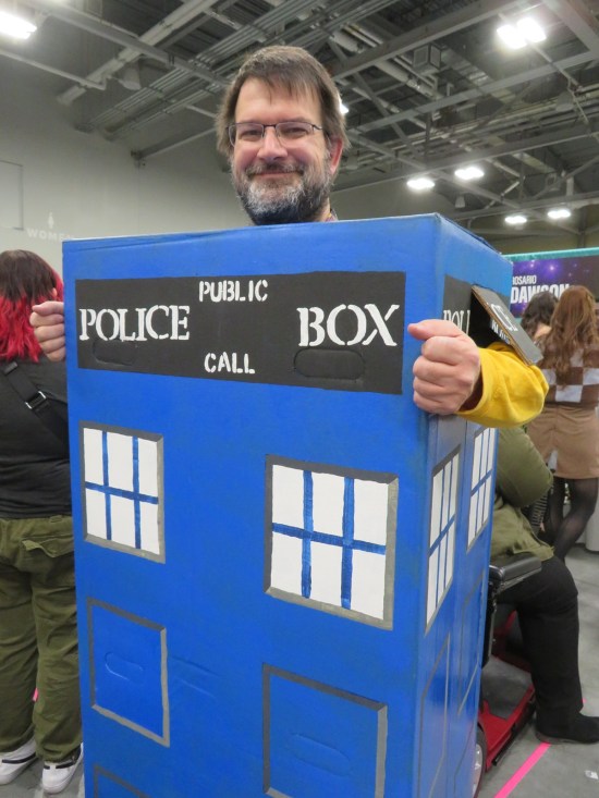 Guy wearing a body-sized TARDIS.