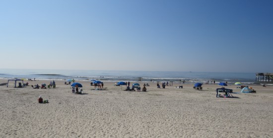 beach with a couple dozen visitors dotted around.