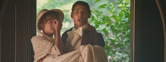 19th-century suitor bursts through manor door carrying embarrassed blond lady in white dress and hat.