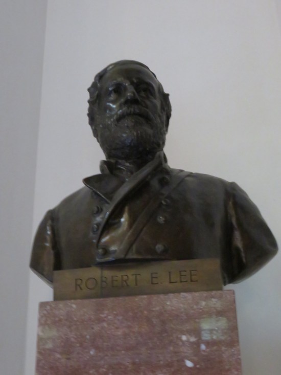 Robert E Lee bust against white wall.