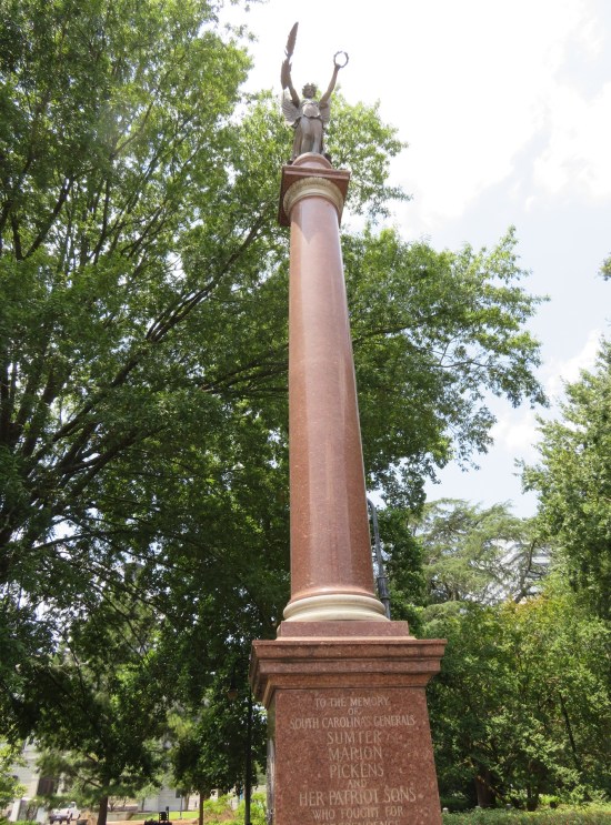 Bronze pillar with names Sumter, Marion, and Pickens on its plaque. Lady Victory stands on top.