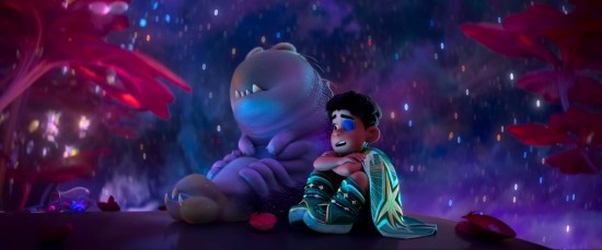 Small child and globby alien sit on an outer space platform, chatting among the pretty stars.