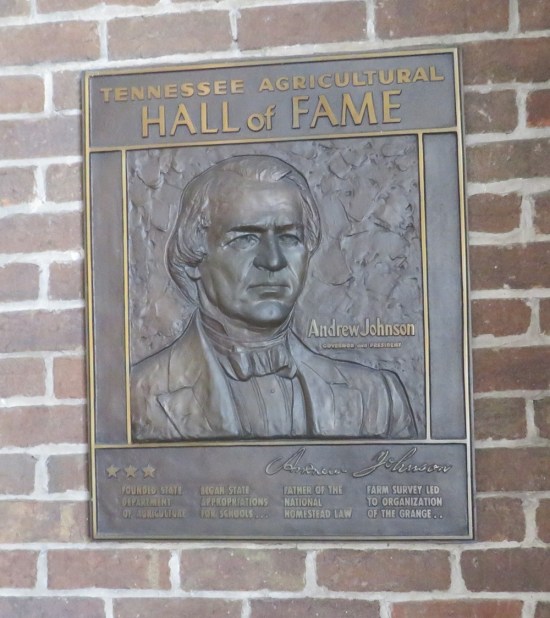 Bronze plaque with embossed bust of Johnson, credited as founding the Tennessee Department of Agriculture, among other group projects.
