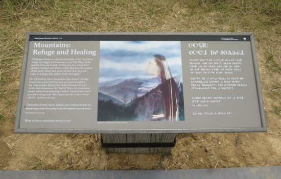 National park sign half in English and half in Cherokee.