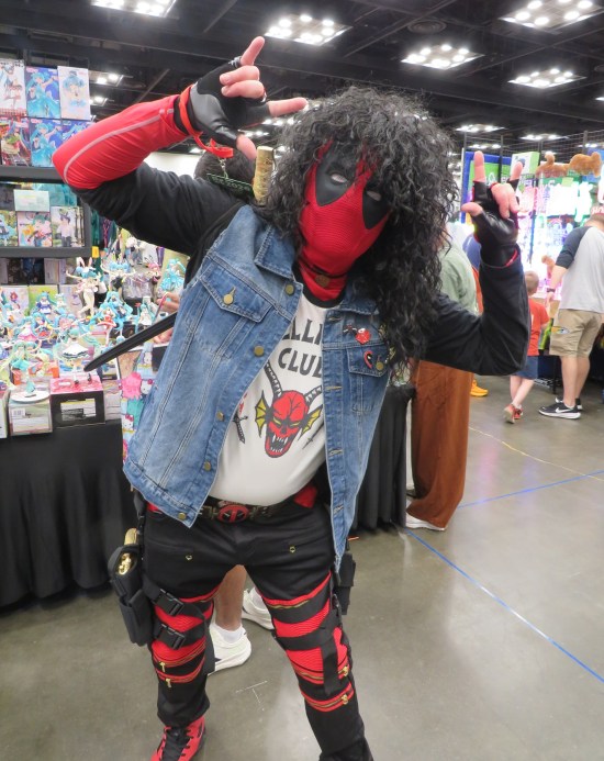 Costume of Eddie Munson from "Stranger Things" with Deadpoool mask, gloves and boots.