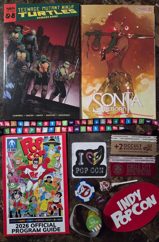 TMNT graphic novel, Sonja Reborn #2, PopCon Indy merch and all the little prizes we won.