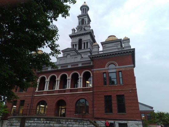 Very tall brick courthouse.