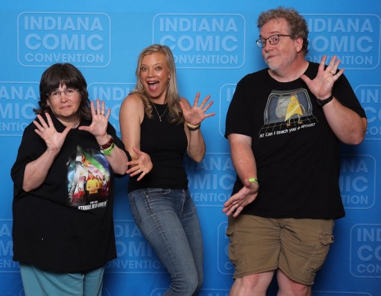 us doing jazz hands with Amy Smart, who is great at them. For some reason unknown to us, Anne has a grumpy look.