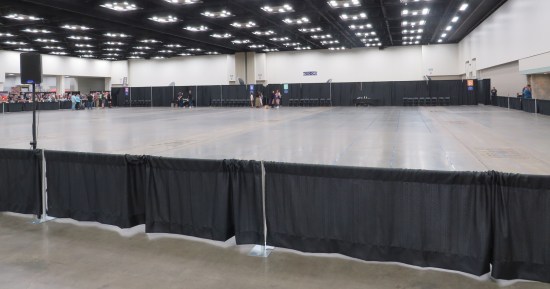 photo op area with almost no one in line, concrete floor very visible.