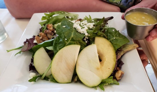 goat cheese and Granny Smith apple salad, with apple slices forward.