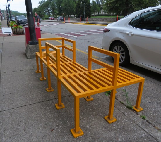 orange art bench but in deformed Backrooms style.