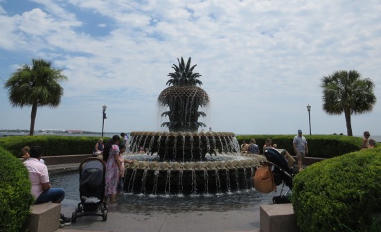 Pineapple Fountain surrounded by frolicking families.