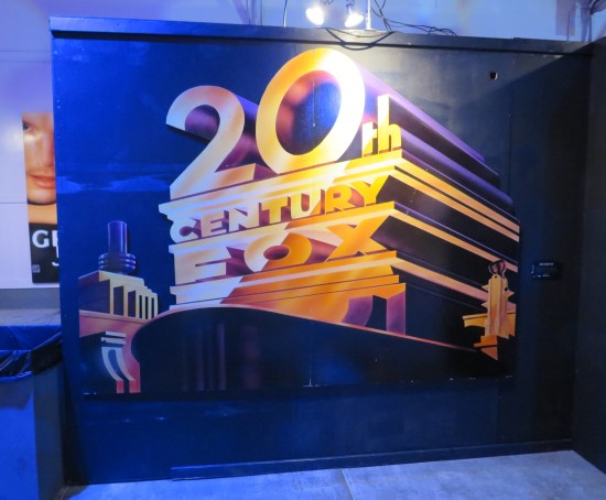 20th Century Fox logo poster hanging in exhibit.