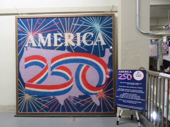 An America 250 wall hanging made entirely of soybeans.