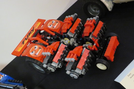 Lego modern giant red tractor with the word "fury" and two red angry emoji on top.