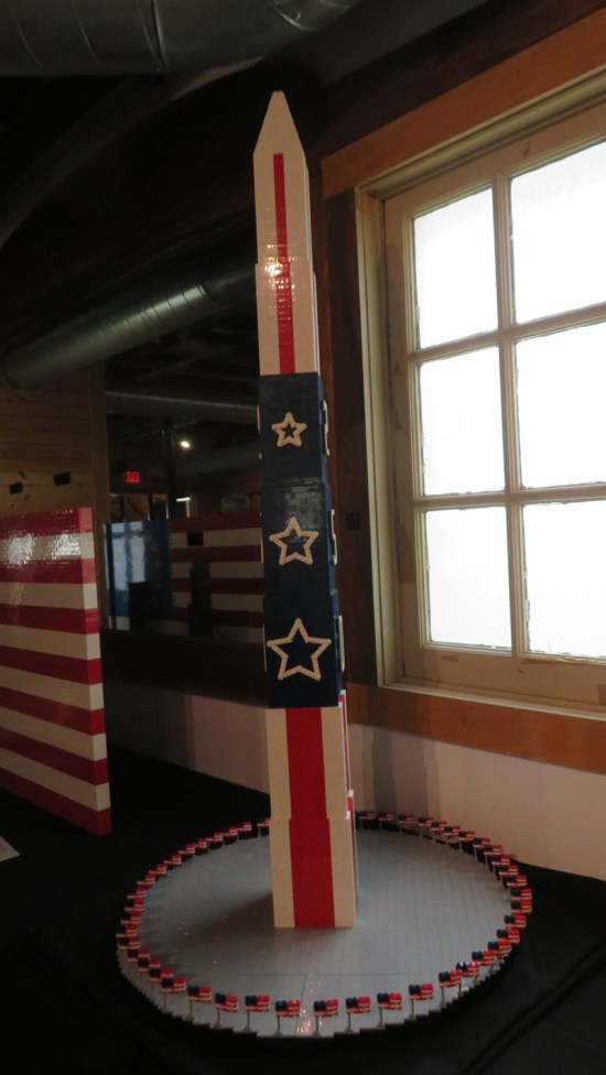 Lego Washington Monument but with red, white and blue flourishes.