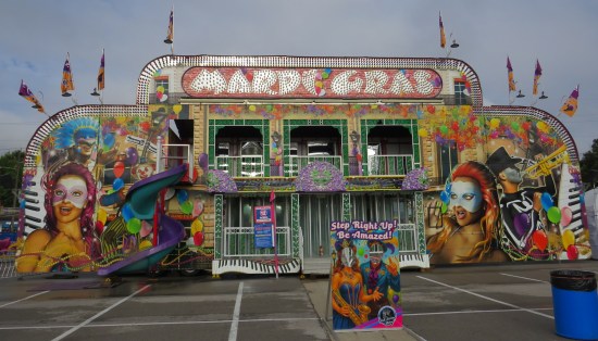 House of mirrors called Mardi Gras, with New Orleans inspired art on the front.