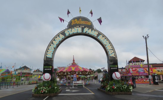 Indiana State Fair Midway grand arch entrance with large baseball at each leg.