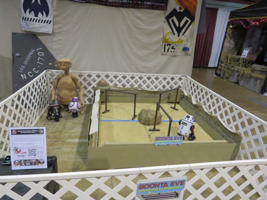 diorama recreating the Phantom Menace pod race. For some reason there's also a big E.T. statue.