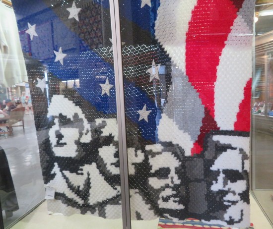 Blanket with Mount Rushmore in front of a US flag backdrop.