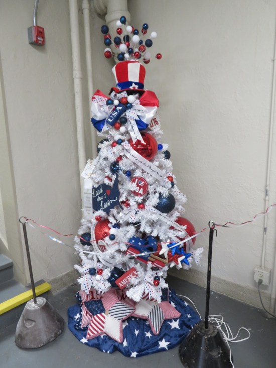 USA-themed Christmas tree in a corner.
