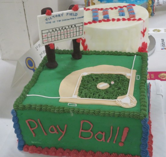 Green cake shaped like a baseball field.