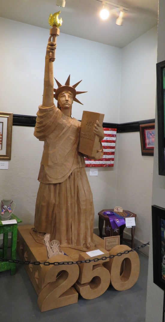 wooden Statue of Liberty tucked in an alcove.