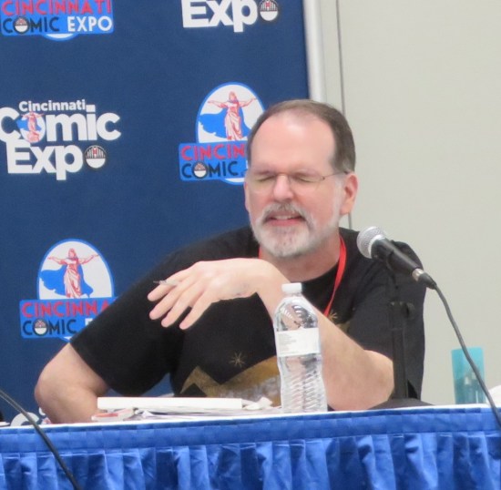 Dave Aikins winces on a panel.