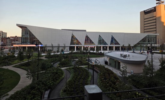 First Financial Center in Cincinnati with angular white roof and lushly treed park on its east end.
