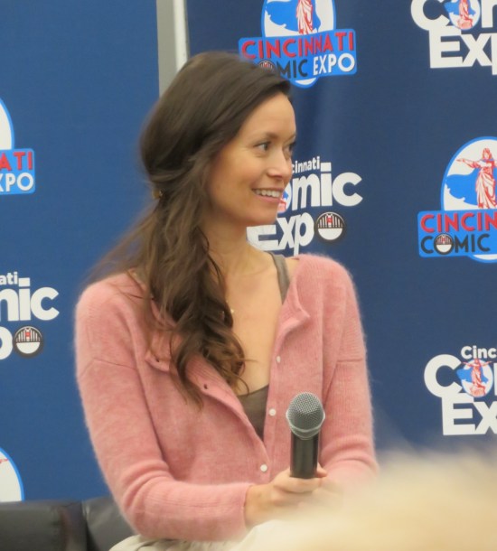 Summer Glau on a panel, smiling and listening to a question.