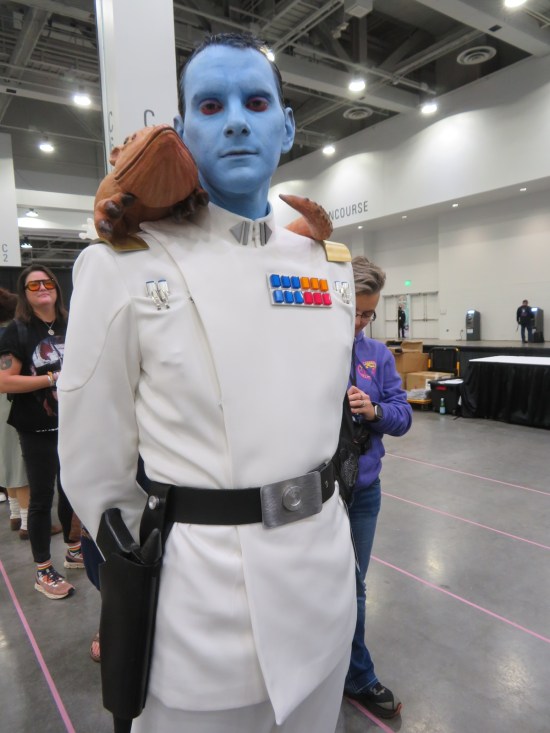 costume of Thrawn with pet Chiss on his shoulder.