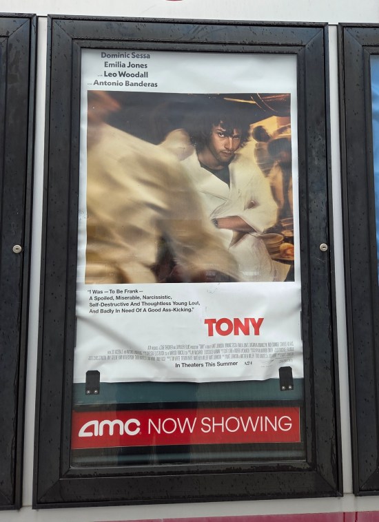 Tony Movie Poster with Dominic Sessa glaring at us, and Bourdain's description of his own younger self: "I was -- to be frank -- a spoiled, miserable, narcissistic, self-destructive and thoughtless young lout and badly in need of a good ass-kicking."