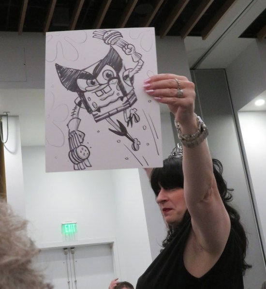 Wolverine SquarePants sketch held high.