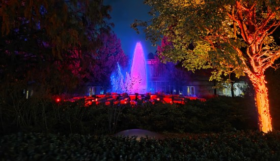Newfields fountain, lit purple at night!