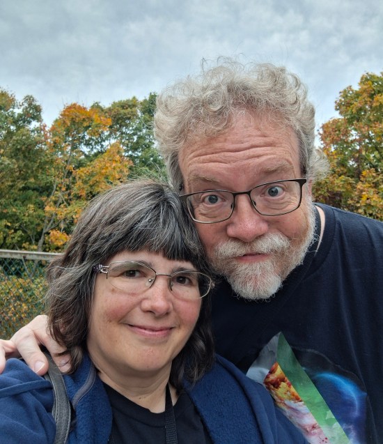 Us in front of trees high up